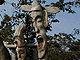 Totems stand at the entrance to Songyojong. Totems stand at the entrance to Songyojong.