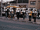 Campaigners hold up photos of their candidate. Campaigners hold up photos of their candidate.