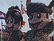 Kyongju World Expo mascots -- cartoon characters made of flowers. Kyongju World Expo mascots -- cartoon characters made of flowers.