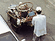 A scrap dealer collects recyclables. A scrap dealer collects recyclables.